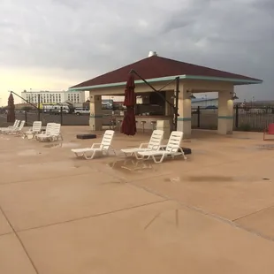 Outdoor snack area, lounge chairs and umbrellas