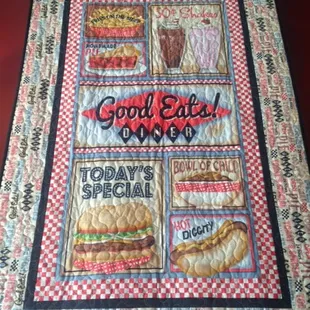 quilt hanging on the wall