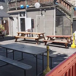 a picnic area with tables and benches
