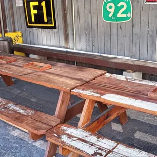 a picnic table with two benches