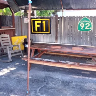 a picnic area with tables and benches