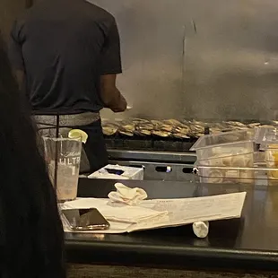 Grilling Fresh oysters shucked right in front of you