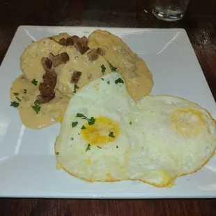 Biscuit and gravy with over easy eggs.