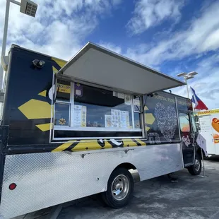 a food truck parked in a parking lot