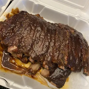 ribs in a styrofoam container