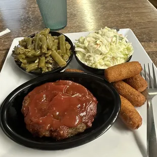 The amazing Meatloaf with green beans, slaw, and hush puppies.  Yummmm!