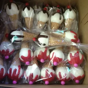Red velvet cake pops shaped like ice cream cones!
