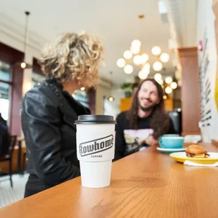 two people in a coffee shop