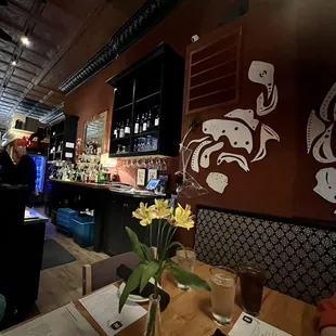 a table with a vase of flowers on it