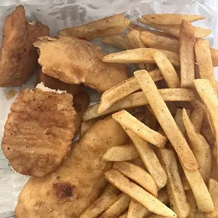 fish and chips in a plastic container