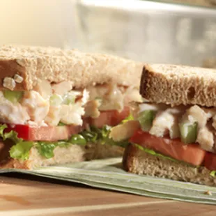 a chicken salad sandwich cut in half