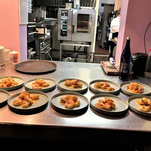 View of the kitchen and the chef/owner at work