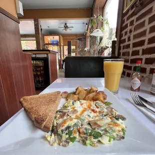 Scrambled Eggs with sausage and orange juice