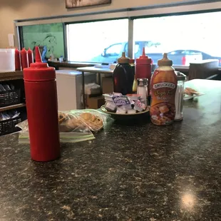 Look! There are condiments on our eating area! (Barflies)