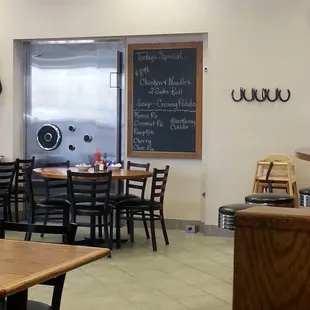 Old bank vault door in the main seating area.