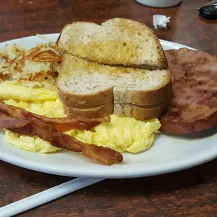 Ham steak, back, eggs, hash brown &amp; toast