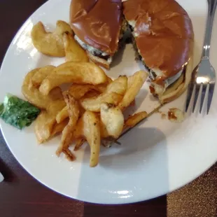 a sandwich and fries on a plate