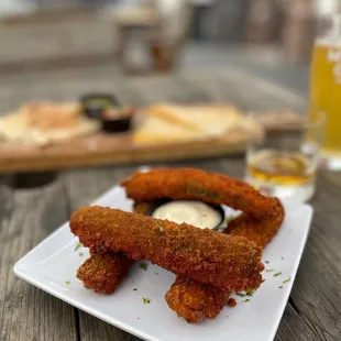 a plate of fried chicken strips