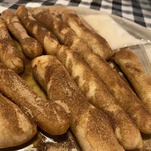 a plate of french bread rolls
