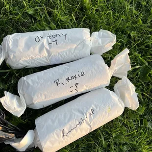 Three sandwiches wrapped up - to Tony's Tri-Tip Sandwich, Roxie Delight Sandwich and the Yama Pastrami Rueben Sandwich