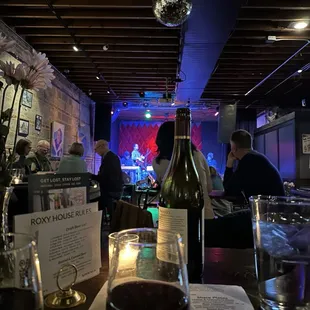 a glass of wine and a bottle of wine