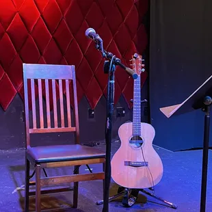 a guitar and a chair