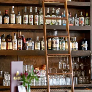 a ladder leaning over a bar