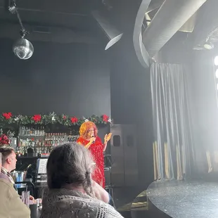 Monica West on the mic, letting the children have it!