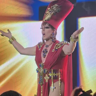 a woman in a red costume