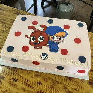 a cake with a cartoon character on it