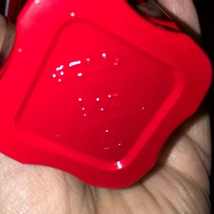 Showing the 9oz red solo cup the black cat chow came in.