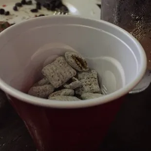 In a 9oz red solo cup for $4.  We had not eaten any of it yet!!!!