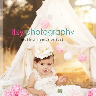 a baby in a teepee surrounded by flowers