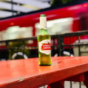 a bottle of beer on a table