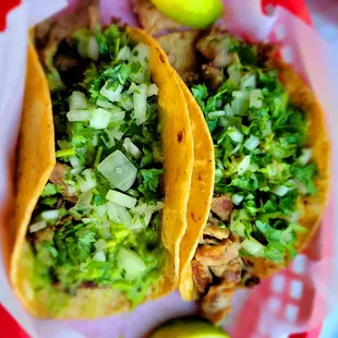 A Pollo and a Carne Taco with guac - YUM!