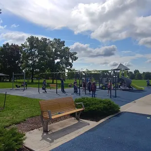 Benches around the edges of the playground