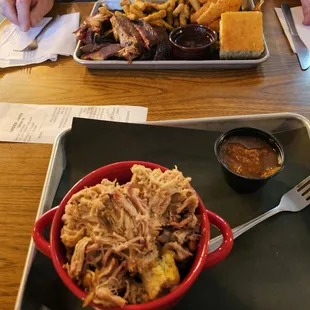 a tray of pulled pork and fries