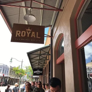 people walking down the sidewalk