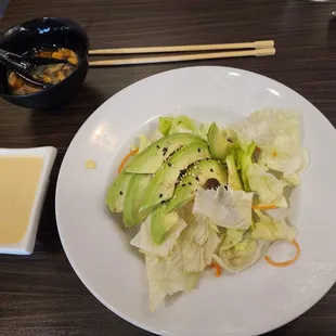 Available salad, generous serving, tasty dressing. More red cabbage would be healthier.