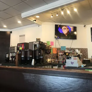 Coffee station behind the cashier