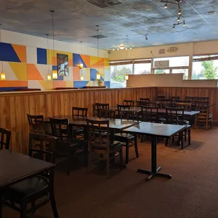 dining area with tables and chairs