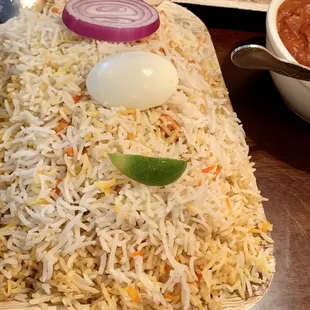 Butter Chicken Biriyani and a spicy lamb tikka masala .