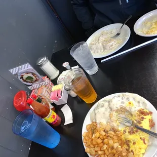 a table full of food and drinks