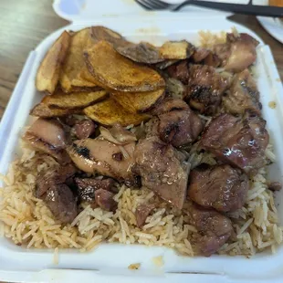 Bourbon chicken plate with spicy rice and Cajun potatoes. Delicious! Great value, too. Recommended.