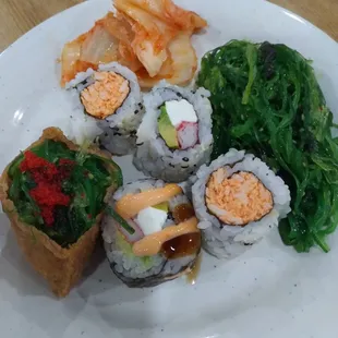 Delicious selection of sushi, kimchi and delicious seaweed dish from great hibachi grill!