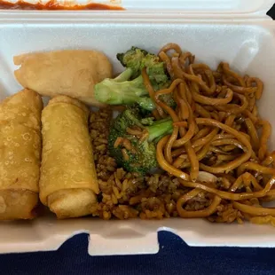 Rice, egg rolls, sweet n sour chicken, and noodles.