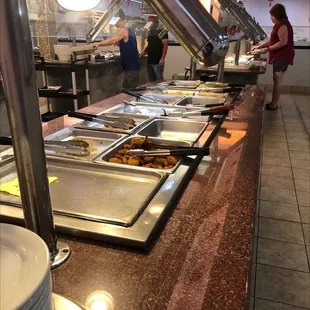 a line of food being served