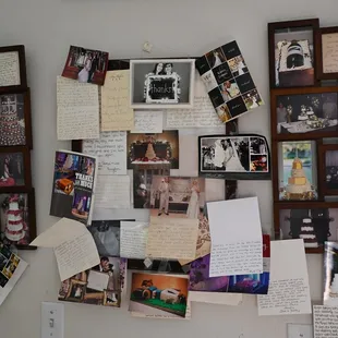 a fridge with a bunch of photos on it