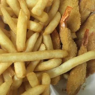 a plate of french fries and a sandwich