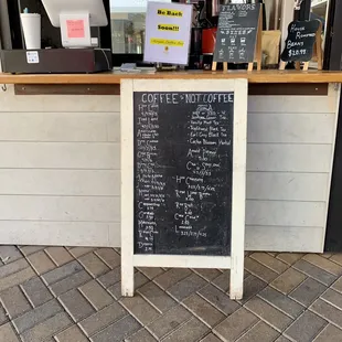 a menu on a chalk board